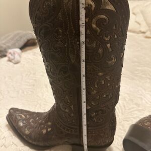 Lucchese Brown leather hand tooled boot. Excellent condition.